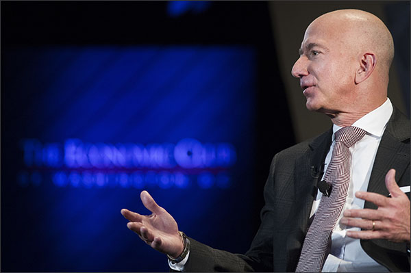 Jeff Bezos, Amazon founder and CEO, speaks at The Economic Club of Washington's Milestone Celebration in Washington, Thursday, Sept. 13, 2018. Bezos said that he is giving $2 billion to start the Bezos Day One Fund which will open preschools in low-income neighborhoods and give money to nonprofits that helps homeless families. (AP Photo/Cliff Owen)