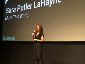 Sara LaHayne presenting at the 2018 HUSTLE event.