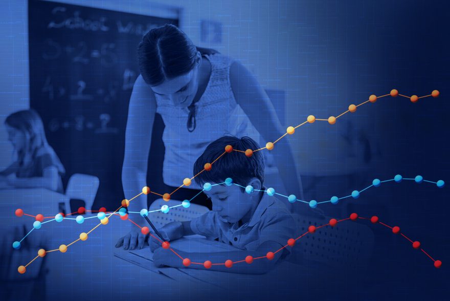 Conceptual blue image of a young female teacher helping her students with their math and chart data plots laying overtop to indicate trends.